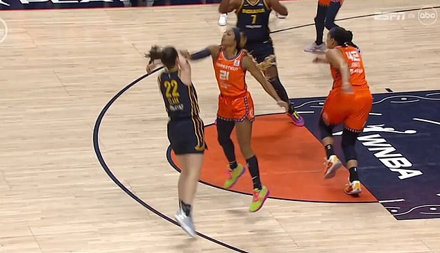 Just 90 seconds into the playoff game, Clark was knocked to the ground by Connecticut guard DiJonai Carrington, who appeared to poke her as he tried to block the ball