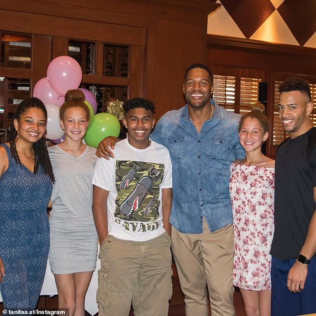 In addition to Tanita (L), Michael also has son Michael Strahan Jr., 29 (R), with Wanda. He also has twin daughters Isabella and Sophia, 19, with his second wife, Jean Muggli; Michael pictured with his children and stepson Dorian (center)