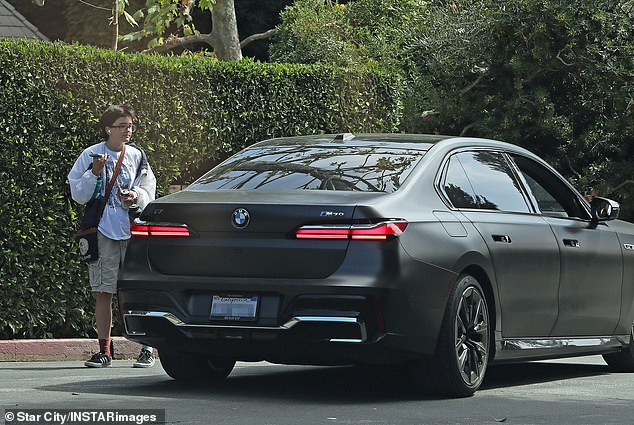 The Oscar-winning actor, 53, who was recently spotted looking tense while smoking a cigarette, pulled over in his black BMW to catch up with the 15-year-old he shares with ex-wife Jennifer Garner