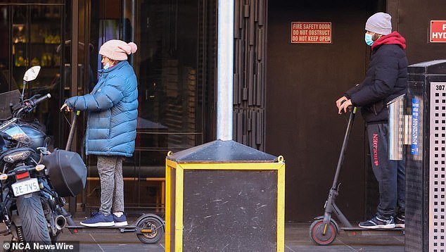 E-scooter riders must stay on the sidewalk in most states. Photo: NewsWire/Brendan Beckett