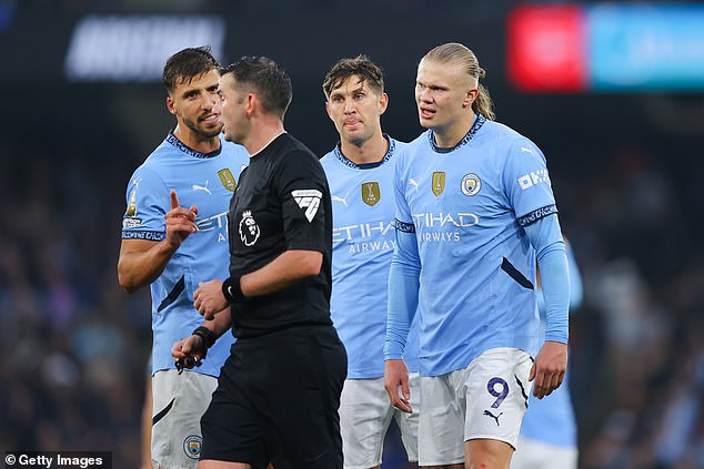 Man City players were furious with referee Michael Oliver, claiming he did not allow Kyle Walker to return to his position before Arsenal scored