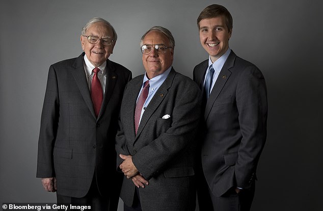 The billionaire's eldest son, Howard (center), who will take over as non-executive chairman of Berkshire Hathaway after his father's death, said it's not an easy task