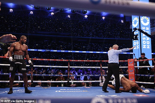 Dubois watched as Joshua struggled to get back on his feet and the match was called off