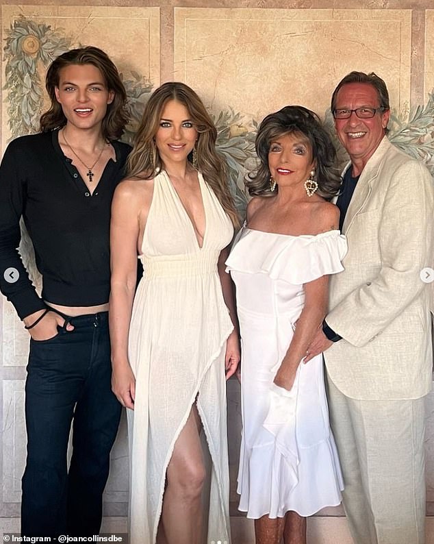 Elizabeth and Joan are good friends and the couple spent last month on holiday together in the South of France (left to right: Damian, Elizabeth, Percy and Joan)