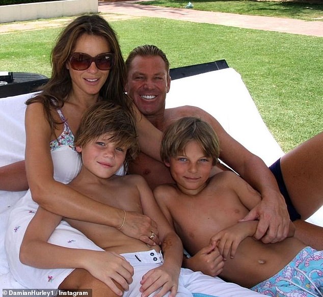 It comes after Damian shared a heartwarming tribute to her late ex-fiancé Shane Warne, to mark what would have been his 55th birthday last week. Pictured: Shane and Elizabeth with Damian Hurley (bottom right) and Jackson Warne (bottom left)