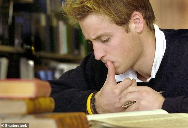 Prince William studies in the main library at St Andrews in 2004