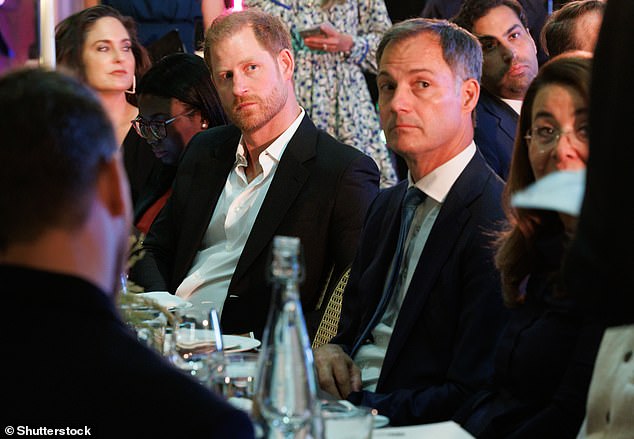 The event was organised by the WHO and was attended by politicians including Belgian Prime Minister Alexander De Croo, pictured here next to Harry. Meghan was noticeably absent after missing actor Kevin Costner's house party because she was 'ill' the day before