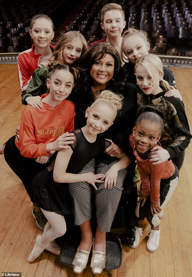 Abby - who rose to fame on Lifetime's Dance Moms - told DailyMail.com: 'I have a lot more choreography. I have a lot more kids to teach' (pictured with young dancers on Dance Moms)