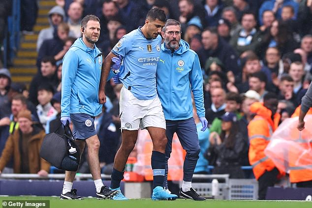 Rodri (centre) limped off the field during City's 2-2 draw with Arsenal on Sunday afternoon