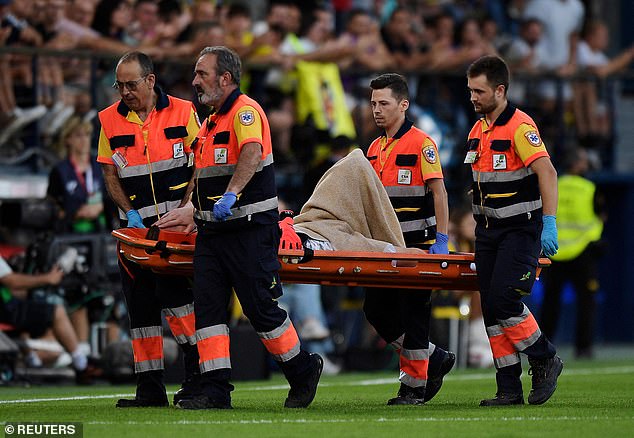 Ter Stegen was stretched off the pitch after tearing his patellar tendon - which connects the kneecap to the shinbone - in his right knee. He was later pictured in a wheelchair at hospital