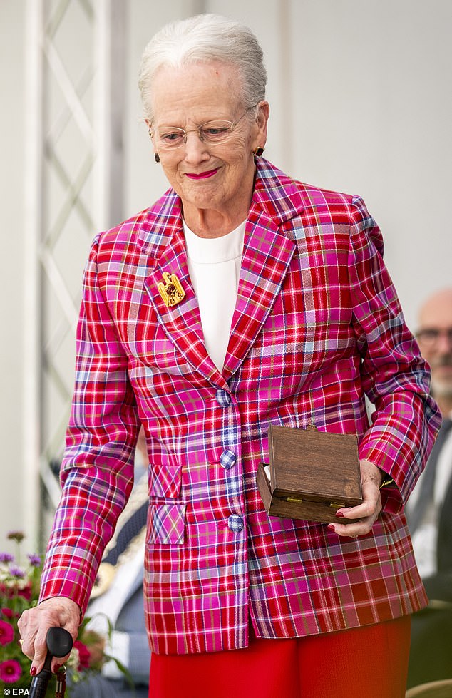 Queen Margrethe of Denmark has been discharged from hospital after a fall at Fredensborg Castle last week - but suffered injuries to her neck and left arm, the palace said on Friday. She is pictured at the Karen Blixen Museum in Copenhagen in September