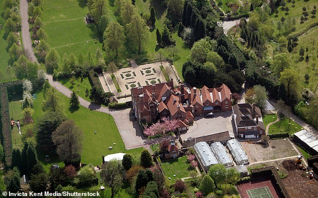 A former groom told how Al-Fayed would sit in a tent on his lawn at his Barrow Green estate in Surrey (pictured) and 'bark at us to jog past him with his horses'