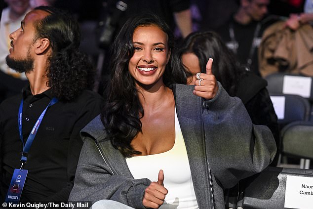 Styling her dark locks into loose curls, Maya flashed her gorgeous smile as she took her seat for the competition and gave a thumbs up for the camera