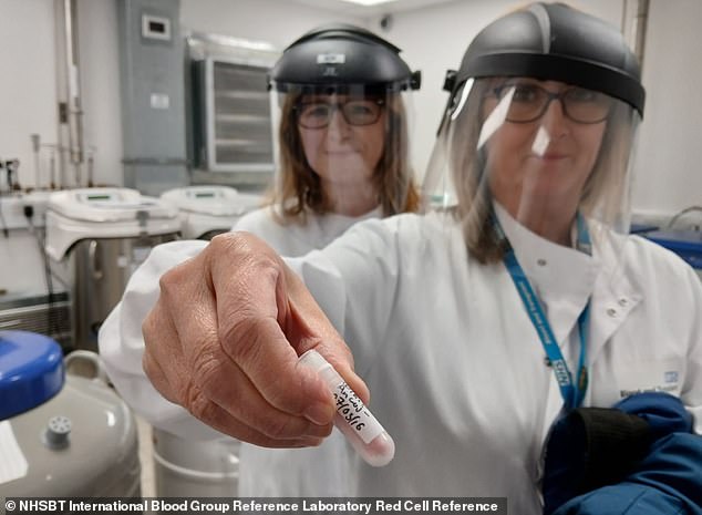 Nicole Thornton, head of the NHSBT's International Blood Group Reference Laboratory 'Red Cell Reference', holds a tube of the blood used to solve the 50-year-old AnWj mystery