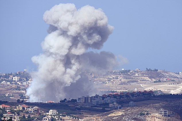 Smoke rises from Israeli airstrikes on villages in the Nabatiyeh district on Monday, September 23