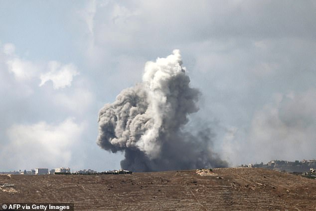 Smoke clouds after an Israeli attack near the border on Monday