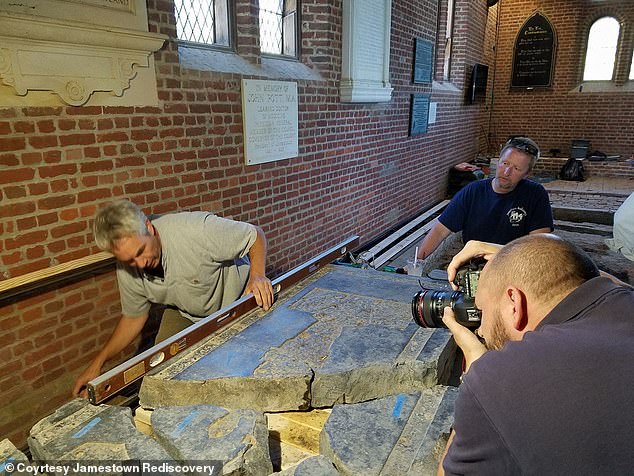 Monument conservator Jonathan Appell is piecing the first pieces of the Knight's Tombstone back together. The tombstone was first discovered broken in 1901