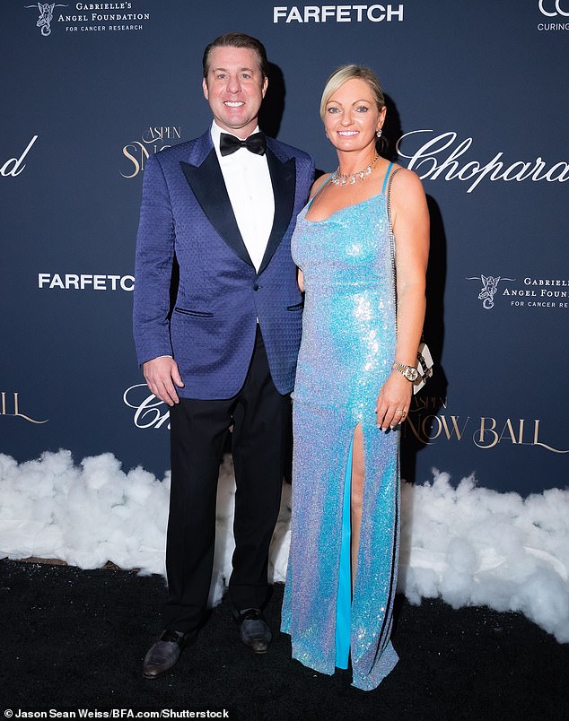 Burrell is seen here with his ex-wife Nikola at a 2023 event in Aspen, where he also owns several properties. The couple split in the months that followed, before Burrell was declared a fugitive after he reportedly defaulted on more than $75 million in bank loans he used to pay off the divorce