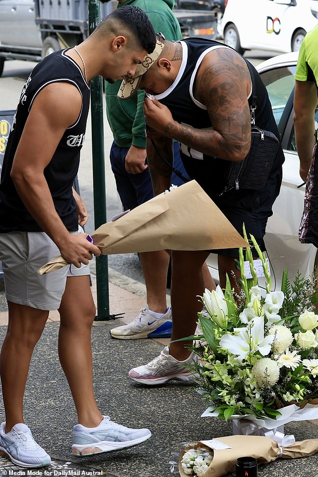 Heartbroken relatives of a young man who was stabbed outside a popular Mexican restaurant have returned to the scene of the shocking crime to leave flowers and pay their respects