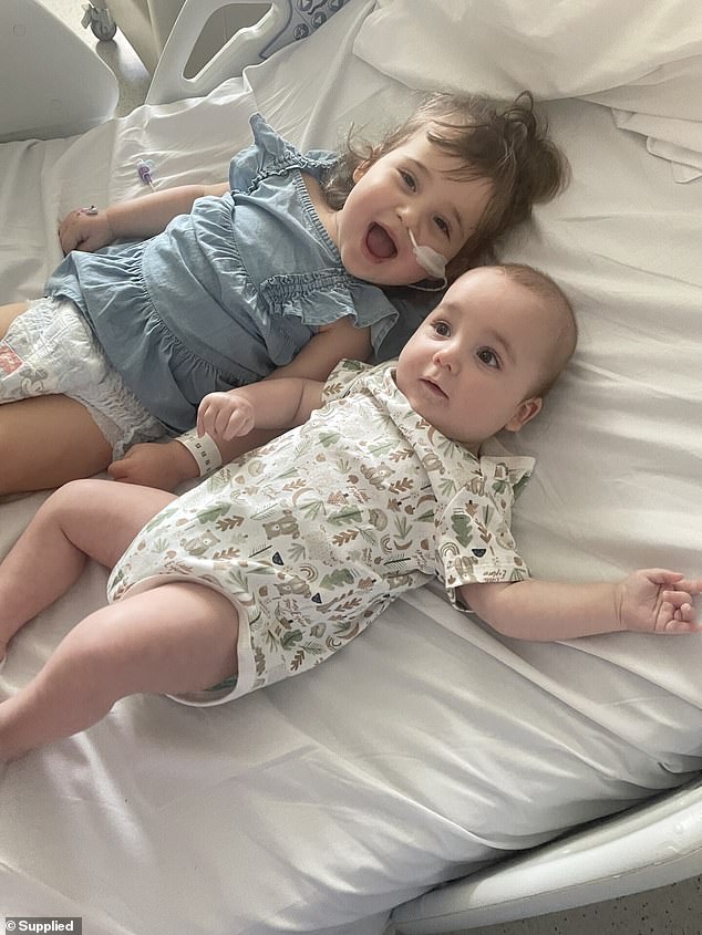 Bella's parents first realized something was wrong when they noticed her limping, but she quickly lost the ability to lift her arms, walk or swallow over the next two weeks (pictured, left)