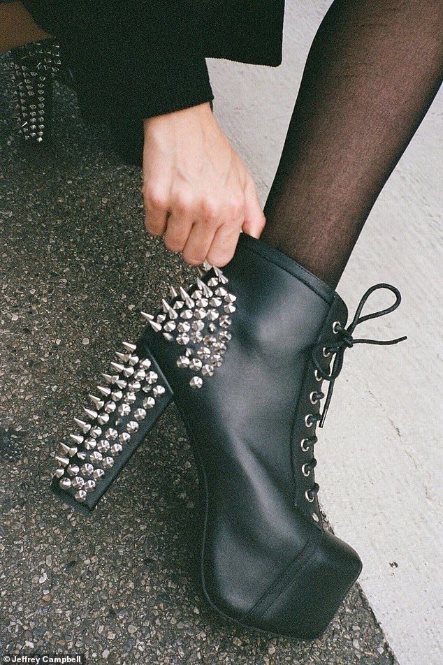 Taylor's towering, patterned lace-up heels bear a striking resemblance to Jeffrey Campbell's polarizing Lita boots (pictured).