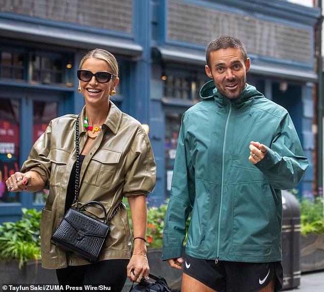 The Irish model, 38, and the former Made In Chelsea actor, 36, didn't let the rain dampen their spirits and left in high spirits