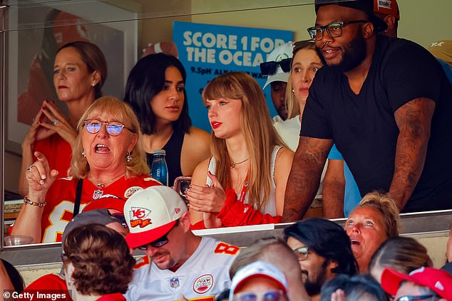 The pop star sat next to Travis Kelce's mother Donna to watch the Chiefs beat the Chicago Bears