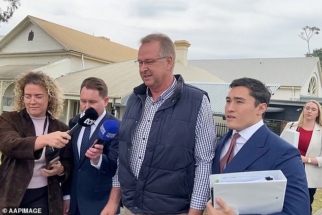 Peter William Smith, 57, (pictured) pleaded guilty on Tuesday. His lawyer Bryan Wrench (right) said his client grew up on a farm and was less sensitive to animals