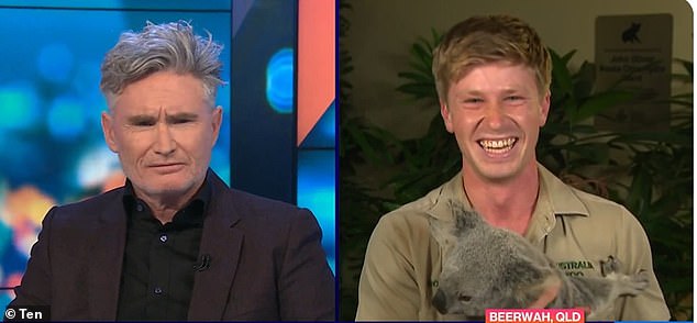 The 20-year-old appeared in a live interview holding a koala, with comedian Dave Hughes (left) quickly quizzing him on whether koalas get 'high' from eating eucalyptus leaves