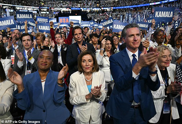 Former U.S. House Speaker Nancy Pelosi (center), Sen. Laphonza Butler (left) and California Governor Gavin Newsom (right) applaud as U.S. Vice President and 2024 Democratic presidential nominee Kamala Harris speaks at the Democratic National Convention (DNC)