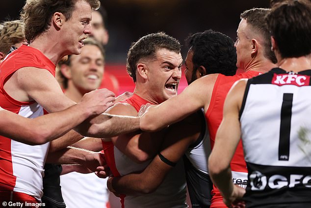 Papley is known for getting on top of his opponents in the AFL (pictured battling Port Adelaide's Willie Rioli in last Friday's preliminary round)