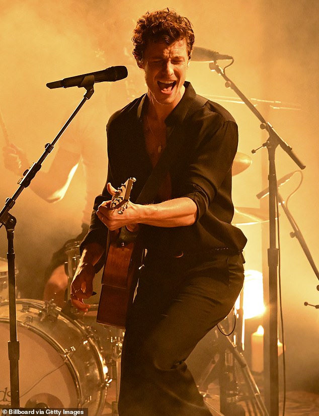 Shortly before her performance at the star-studded awards show, Shawn also took to the stage to perform his song Nobody Knows (seen above) — which was released on September 12