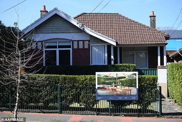 The 50 percent cut in capital gains tax on residential property is expected to cost $5.4 billion in 2024-25, rising to $7.94 billion in 2033-34 (pictured a house for sale in Sydney)