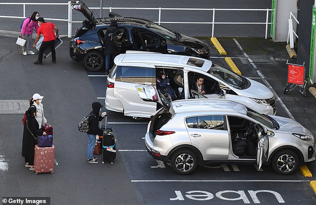 Uber has changed the process for booking a ride from the airport, requiring passengers to use 'PIN technology' (pictured passengers departing Sydney Airport)