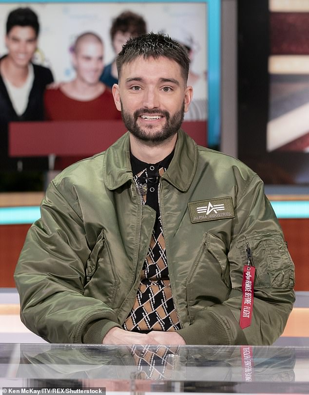 The Wanted's Tom Parker died in 2022 after being diagnosed with glioblastoma. Pictured: Tom Parker in the Christmas special of Good Morning Britain in December 2021