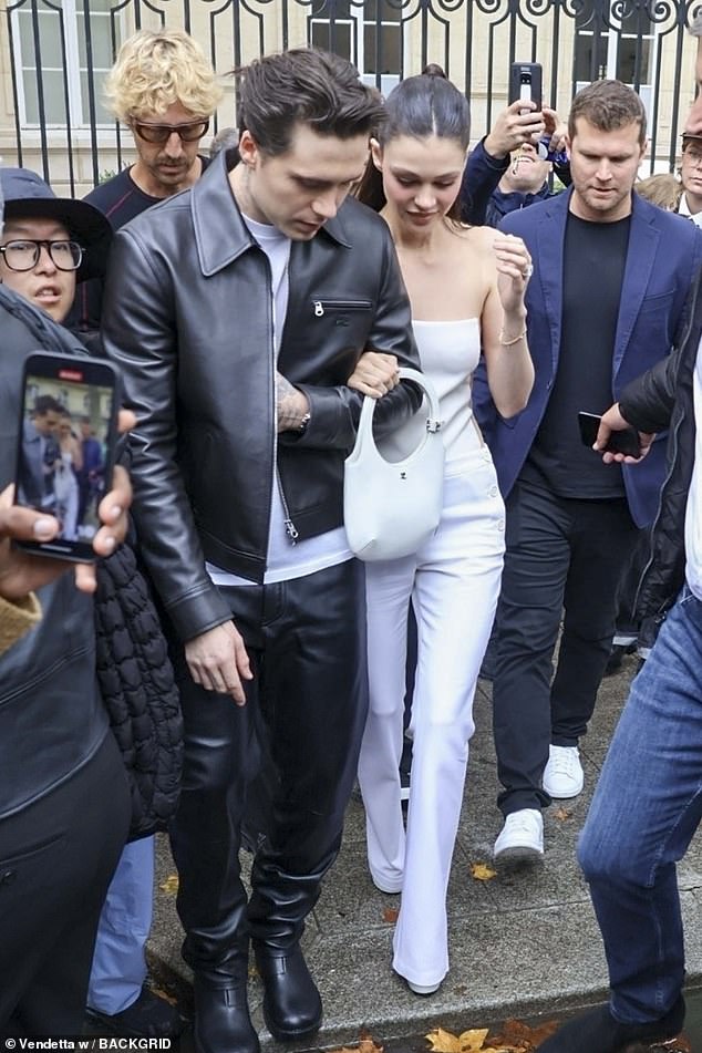 The couple were swarmed by fans as they left the show, with Nicola holding her husband's arm