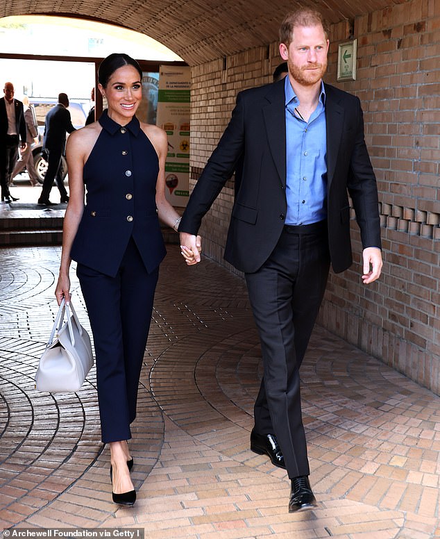 The Duke and Duchess of Sussex - who stepped back as working royals in 2020 - pictured during their visit to Colombia on August 15