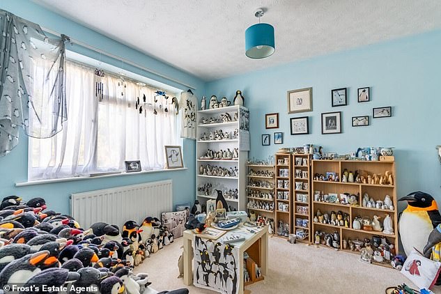 Hidden among snaps of a perfectly matching bedroom and bathroom, a bizarre room is completely overwhelmed by penguins