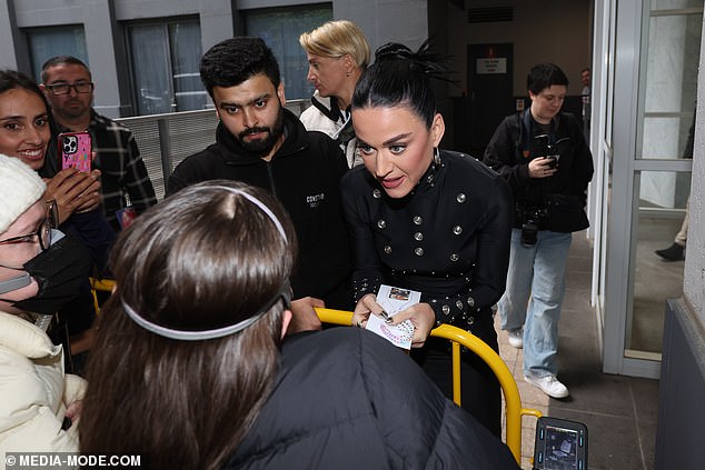 She seemed genuinely happy to be in the company of so many adoring fans, and beamed as she approached