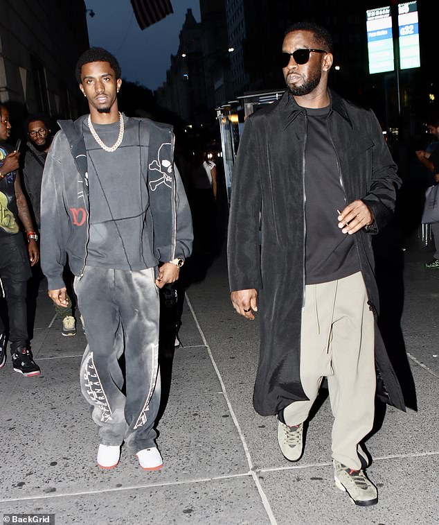 Combs was photographed walking in downtown Manhattan with his son Christian Combs, 26, hours before his arrest Monday