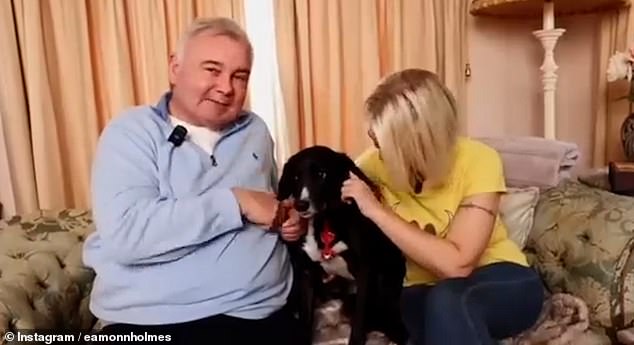 The 64-year-old GB News presenter posted a clip on Instagram on Tuesday of himself lovingly petting a black dog named Bella