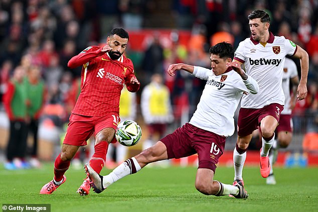 Edson Alvarez (centre) was sent off for two yellow cards, including a foul on Mo Salah