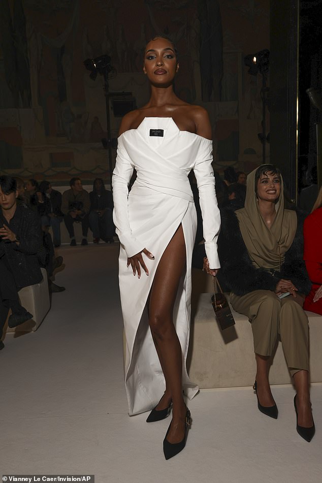 Jourdan wore a white dress with a thigh-length slit, which showed off her tinted pins perfectly