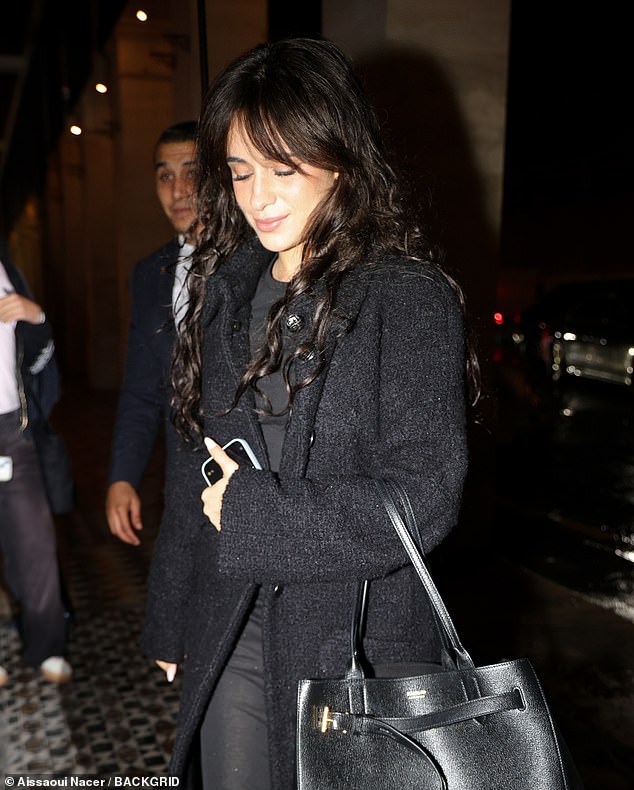 But hours later, the four-time Grammy nominee headed to a dinner in Paris with her signature long, fringed brown hair