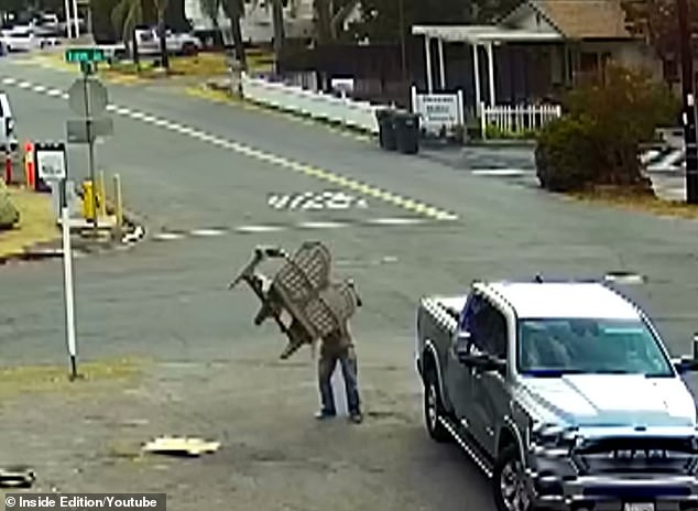 The thief drove by, backed up, stopped next to the stand and began loading the table and chairs into the back of his truck