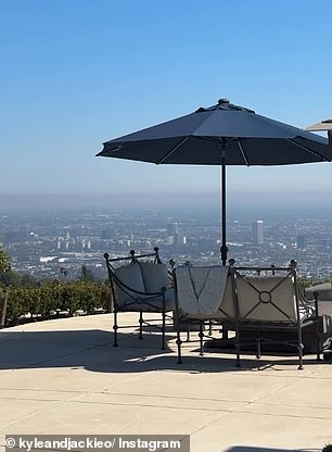 Kyle also showed off the gorgeous view of the city from his pool