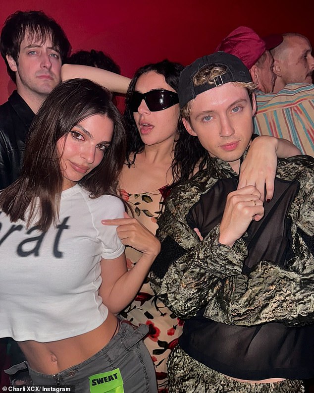 Charli later had a party with American star Emily Ratajkowski (left)