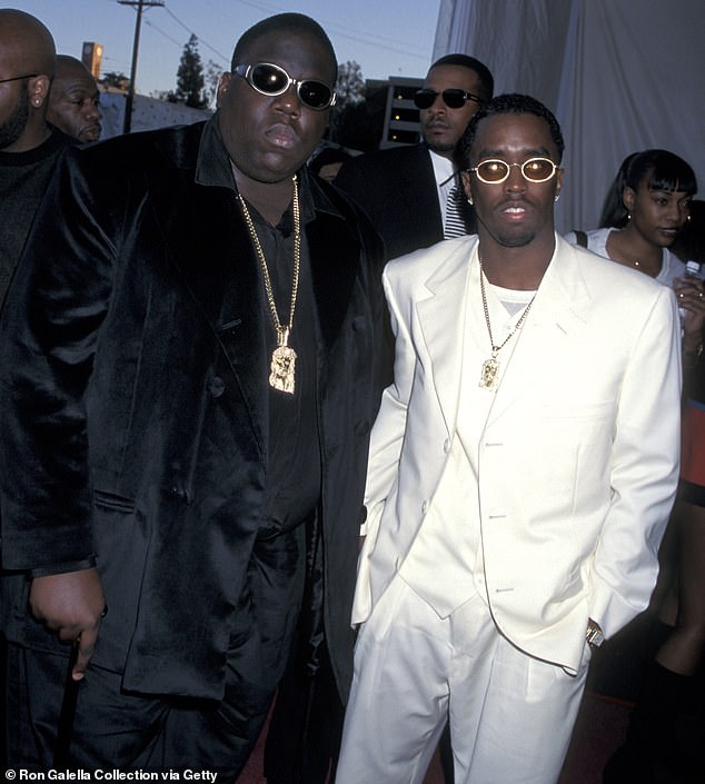 Biggie, pictured with Porter's ex-husband Sean 'Diddy' Combs, was murdered in a drive-by shooting in 1997