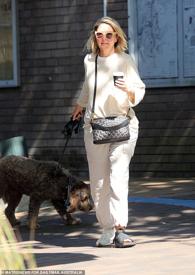 Gardner was seen wearing a 'post-operative' shoe on her left foot while walking her dog