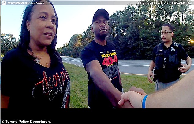 In the bodycam footage, officers mistake the pair for Kinaya's mother and father, but Willis corrects them, describing the 51-year-old Wade as 